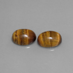 Achetez naturel ct marron tiger's eye gems, coupe ovale, en provenance thaïlande chez gemselect. en stock, livraison internationale!