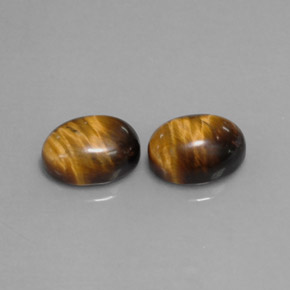 Achetez naturel ct marron tiger's eye gems, coupe ovale, en provenance thaïlande chez gemselect. en stock, livraison internationale!
