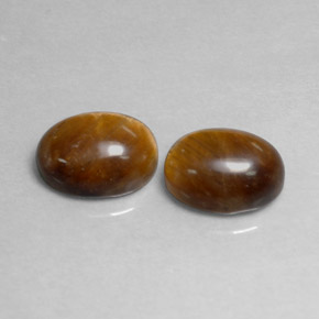 Achetez naturel ct Or Brun Oeil de Tigre gems, Coupe ovale, En provenance Thaïlande chez GemSelect. En stock, livraison internationale!