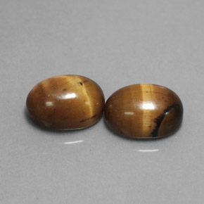 Achetez naturel ct marron tiger's eye gems, coupe ovale, en provenance thaïlande chez gemselect. en stock, livraison internationale!