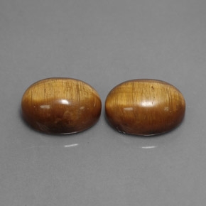 Achetez naturel ct marron tiger's eye gems, coupe ovale, en provenance thaïlande chez gemselect. en stock, livraison internationale!