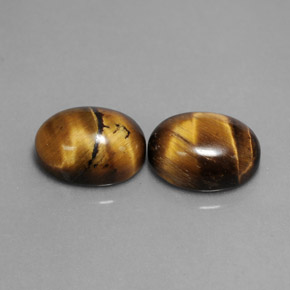 Achetez naturel ct marron tiger's eye gems, coupe ovale, en provenance thaïlande chez gemselect. en stock, livraison internationale!
