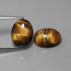 Achetez naturel ct marron tiger's eye gems, coupe ovale, en provenance thaïlande chez gemselect. en stock, livraison internationale!
