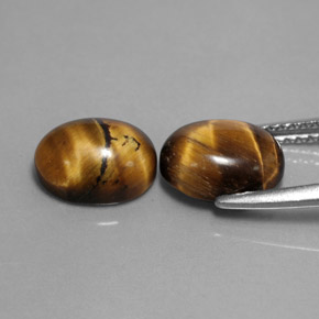 Achetez naturel ct marron tiger's eye gems, coupe ovale, en provenance thaïlande chez gemselect. en stock, livraison internationale!