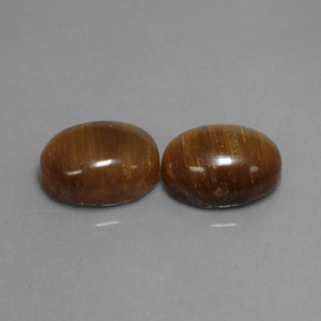 Achetez naturel ct marron tiger's eye gems, coupe ovale, en provenance thaïlande chez gemselect. en stock, livraison internationale!
