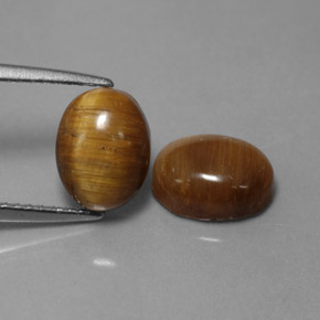 Achetez naturel ct marron tiger's eye gems, coupe ovale, en provenance thaïlande chez gemselect. en stock, livraison internationale!