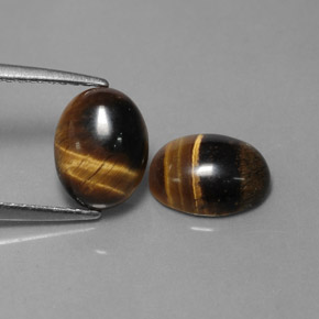 Achetez naturel ct marron tiger's eye gems, coupe ovale, en provenance thaïlande chez gemselect. en stock, livraison internationale!