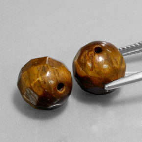 Achetez naturel ct marron tiger's eye gems, sphère / boule, en provenance thaïlande chez gemselect. en stock, livraison internationale!