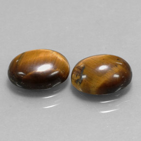 Achetez naturel ct marron tiger's eye gems, coupe ovale, en provenance thaïlande chez gemselect. en stock, livraison internationale!