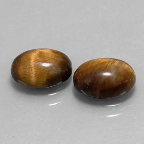 Achetez naturel ct marron tiger's eye gems, coupe ovale, en provenance thaïlande chez gemselect. en stock, livraison internationale!