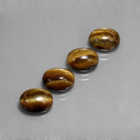 Achetez naturel ct Or Brun Oeil de Tigre gems, Coupe ovale, En provenance Thaïlande chez GemSelect. En stock, livraison internationale!