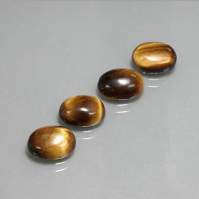 Achetez naturel ct Or Brun Oeil de Tigre gems, Coupe ovale, En provenance Thaïlande chez GemSelect. En stock, livraison internationale!