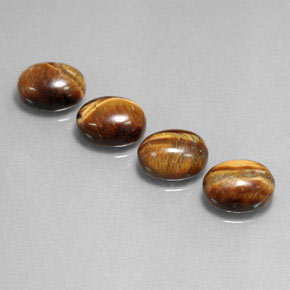Achetez naturel ct marron tiger's eye gems, coupe ovale, en provenance thaïlande chez gemselect. en stock, livraison internationale!