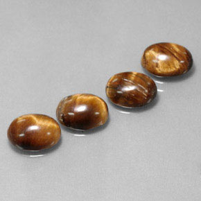 Achetez naturel ct marron tiger's eye gems, coupe ovale, en provenance thaïlande chez gemselect. en stock, livraison internationale!