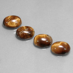 Achetez naturel ct marron tiger's eye gems, coupe ovale, en provenance thaïlande chez gemselect. en stock, livraison internationale!