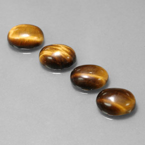 Achetez naturel ct Or Brun Oeil de Tigre gems, Coupe ovale, En provenance Thaïlande chez GemSelect. En stock, livraison internationale!
