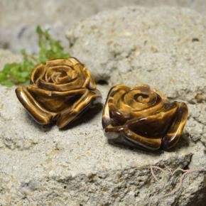 Shop natural 23.62ct Brun pain d'épices Œil de tigre gems, Taille Fleur, from Thaïlande at GemSelect. In stock, global shipping!