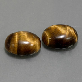 Achetez naturel ct marron tiger's eye gems, coupe ovale, en provenance thaïlande chez gemselect. en stock, livraison internationale!