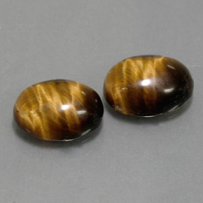 Achetez naturel ct marron tiger's eye gems, coupe ovale, en provenance thaïlande chez gemselect. en stock, livraison internationale!