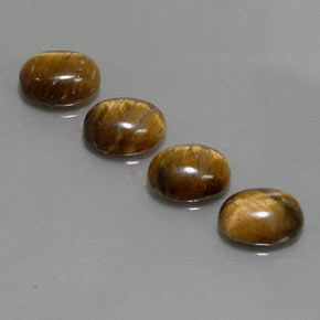 Achetez naturel ct marron tiger's eye gems, coupe ovale, en provenance thaïlande chez gemselect. en stock, livraison internationale!
