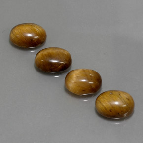 Achetez naturel ct marron tiger's eye gems, coupe ovale, en provenance thaïlande chez gemselect. en stock, livraison internationale!