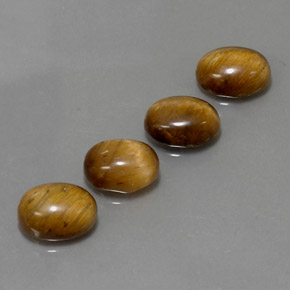 Achetez naturel ct marron tiger's eye gems, coupe ovale, en provenance thaïlande chez gemselect. en stock, livraison internationale!