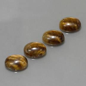 Achetez naturel ct Or Brun Œil de tigre gems, Coupe ovale, En provenance Thaïlande chez GemSelect. En stock, livraison internationale!