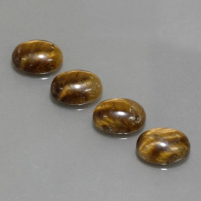 Achetez naturel ct Or Brun Œil de tigre gems, Coupe ovale, En provenance Thaïlande chez GemSelect. En stock, livraison internationale!