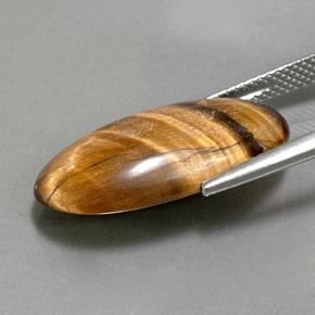 Tiger's eye marron naturelle coupe ovale, 11,79 ct, opaque