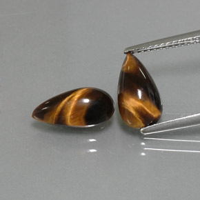 Achetez naturel ct Or Brun Oeil de Tigre gems, En forme de poire, En provenance Thaïlande chez GemSelect. En stock, livraison internationale!