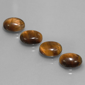 Achetez naturel ct marron tiger's eye gems, coupe ovale, en provenance thaïlande chez gemselect. en stock, livraison internationale!