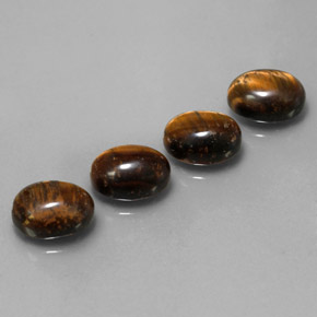 Achetez naturel ct marron tiger's eye gems, coupe ovale, en provenance thaïlande chez gemselect. en stock, livraison internationale!