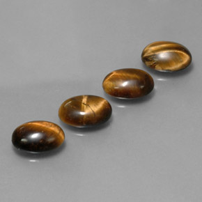 Achetez naturel ct marron tiger's eye gems, coupe ovale, en provenance thaïlande chez gemselect. en stock, livraison internationale!