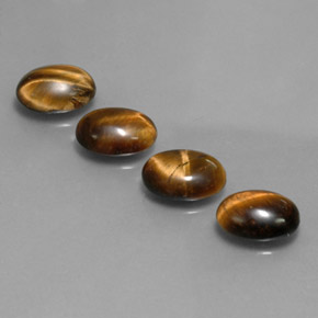 Achetez naturel ct marron tiger's eye gems, coupe ovale, en provenance thaïlande chez gemselect. en stock, livraison internationale!