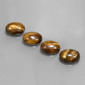 Achetez naturel ct marron tiger's eye gems, coupe ovale, en provenance thaïlande chez gemselect. en stock, livraison internationale!