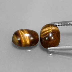 Achetez naturel ct marron tiger's eye gems, coupe ovale, en provenance thaïlande chez gemselect. en stock, livraison internationale!