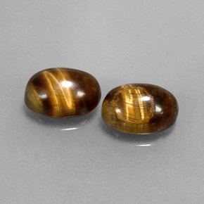 Achetez naturel ct marron tiger's eye gems, coupe ovale, en provenance thaïlande chez gemselect. en stock, livraison internationale!