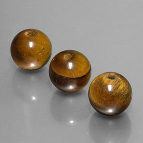 Achetez naturel ct marron tiger's eye gems, sphère / boule, en provenance thaïlande chez gemselect. en stock, livraison internationale!