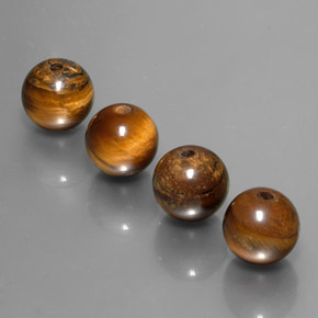 Achetez naturel ct Or Brun Oeil de Tigre gems, Sphère / Boule, En provenance Thaïlande chez GemSelect. En stock, livraison internationale!