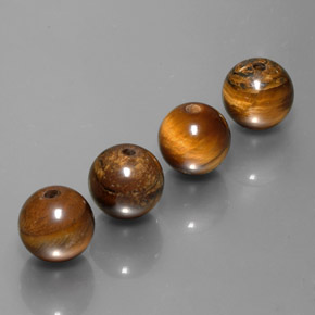Achetez naturel ct Or Brun Oeil de Tigre gems, Sphère / Boule, En provenance Thaïlande chez GemSelect. En stock, livraison internationale!