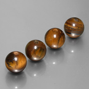 Achetez naturel ct Or Brun Oeil de Tigre gems, Sphère / Boule, En provenance Thaïlande chez GemSelect. En stock, livraison internationale!