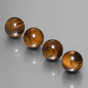 Achetez naturel ct Or Brun Oeil de Tigre gems, Sphère / Boule, En provenance Thaïlande chez GemSelect. En stock, livraison internationale!