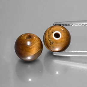 Achetez naturel ct marron tiger's eye gems, sphère / boule, en provenance thaïlande chez gemselect. en stock, livraison internationale!