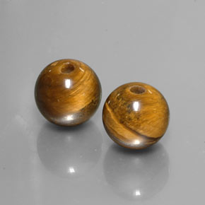 Achetez naturel ct marron tiger's eye gems, sphère / boule, en provenance thaïlande chez gemselect. en stock, livraison internationale!
