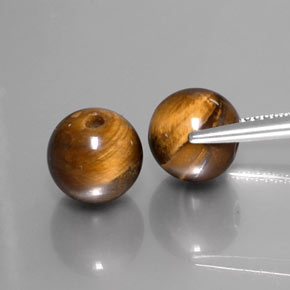 Achetez naturel ct marron tiger's eye gems, sphère / boule, en provenance thaïlande chez gemselect. en stock, livraison internationale!