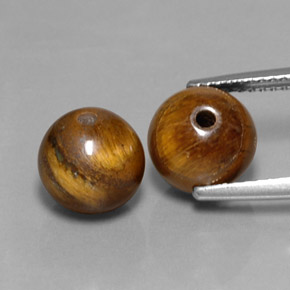 Achetez naturel ct marron tiger's eye gems, sphère / boule, en provenance thaïlande chez gemselect. en stock, livraison internationale!