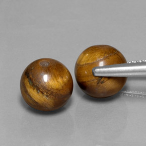 Achetez naturel ct marron tiger's eye gems, sphère / boule, en provenance thaïlande chez gemselect. en stock, livraison internationale!