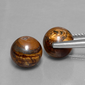 Achetez naturel ct marron tiger's eye gems, sphère / boule, en provenance thaïlande chez gemselect. en stock, livraison internationale!