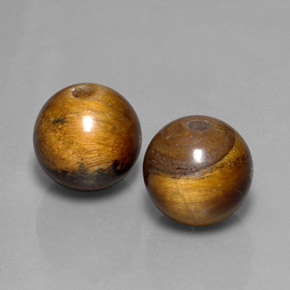 Achetez naturel ct marron tiger's eye gems, sphère / boule, en provenance thaïlande chez gemselect. en stock, livraison internationale!