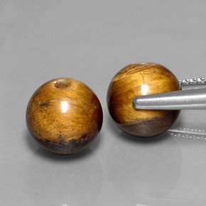 Achetez naturel ct marron tiger's eye gems, sphère / boule, en provenance thaïlande chez gemselect. en stock, livraison internationale!